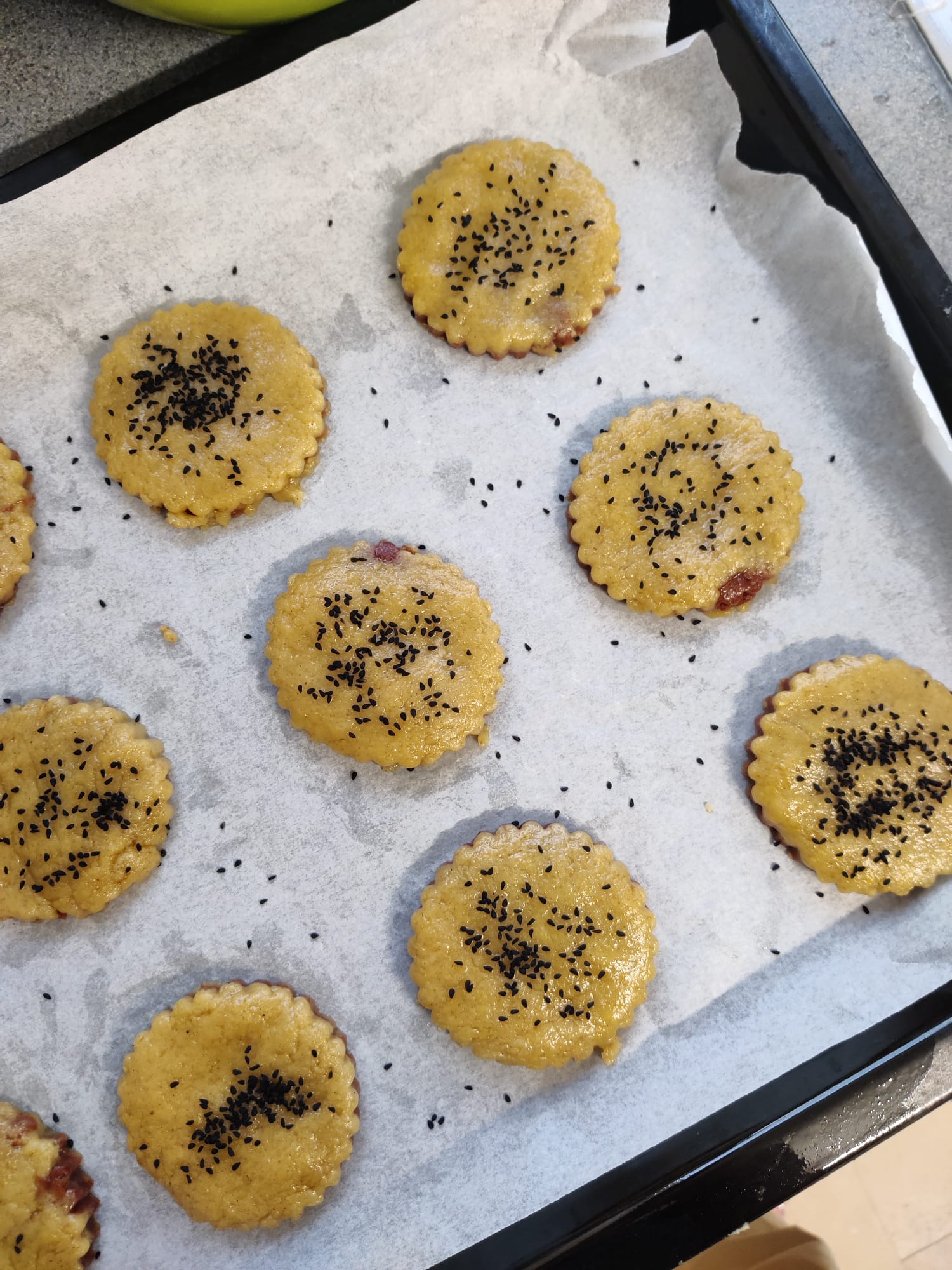 date cookies in a sheet pan ready to bake