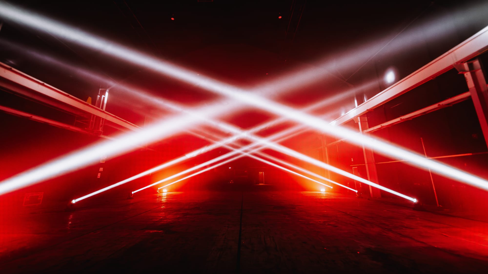 The inside of The Prospect Building with spotlights casting along the walls 