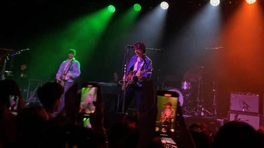 A group of people on a stage

AI-generated content may be incorrect.