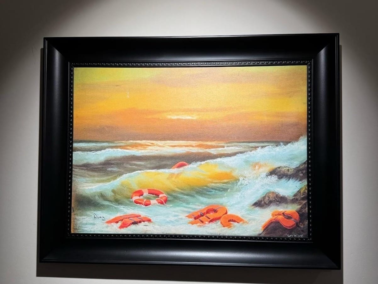 A framed picture of a beach
AI-generated content may be incorrect.