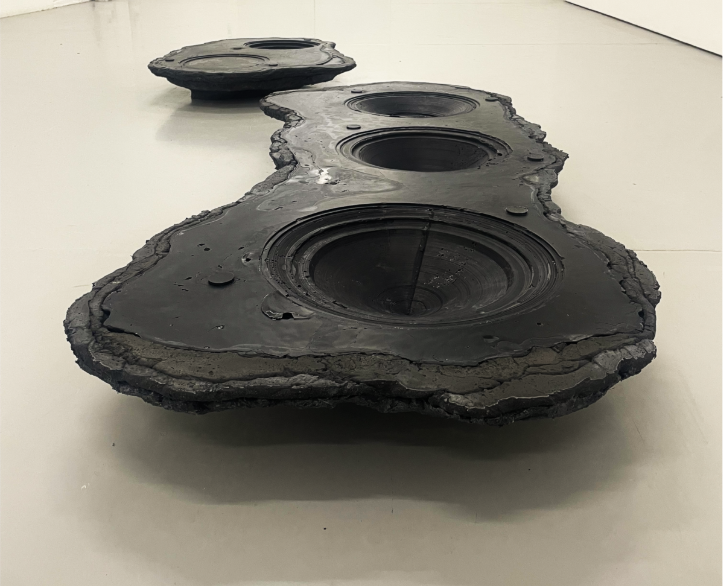 A black object on the floor

AI-generated content may be incorrect.