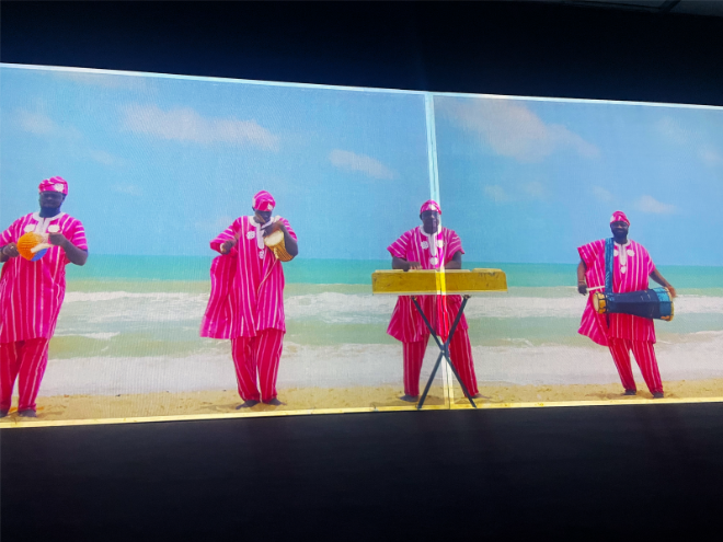 A group of men playing instruments on a beach

AI-generated content may be incorrect.